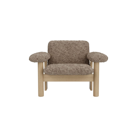 Audo Copenhagen Brasilia Lounge Chair, Low Back in Natural Oak with Sheepskin Sahara, packshot on white