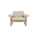 Audo Copenhagen Brasilia Lounge Chair, Low Back in Natural Oak with Sheepskin Natural, packshot on white