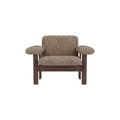 Audo Copenhagen Brasilia Lounge Chair, Low Back in Dark Stained Oak with Sheepskin Sahara, packshot on white