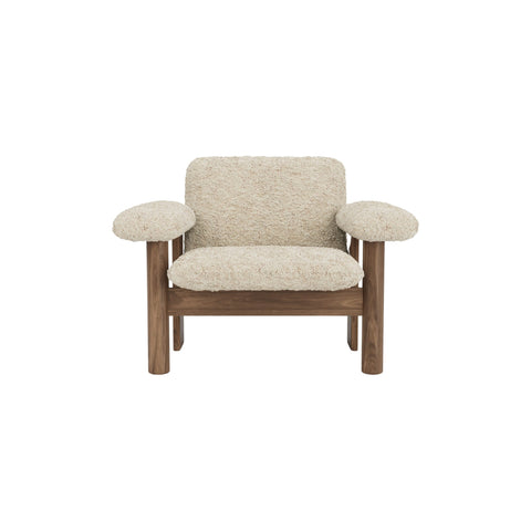 Audo Copenhagen Brasilia Lounge Chair, Low Back in Walnut with Sheepskin Natural, packshot on white