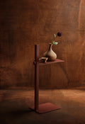 Museum Side Table in rust red styled with ceramic vase, Scandinavian modern design