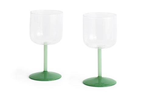 HAY Tint Wine Glasses, Jade Light and Dark Green, tinted borosilicate wine glasses, pair with clear bowls and green stems on a white background