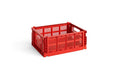 HAY Colour Crate, Medium, Red, folding recycled plastic storage crate, angled packshot on a plain white background