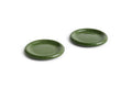 HAY Barro Plates, Ø18, Green, glazed terracotta side plates in olive green, two shown at an angle on plain white