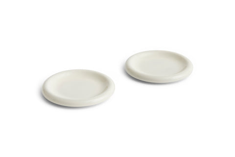 HAY Barro Plates, Ø18, Off-White, glazed terracotta side plates, two shown at an angle on a plain white background
