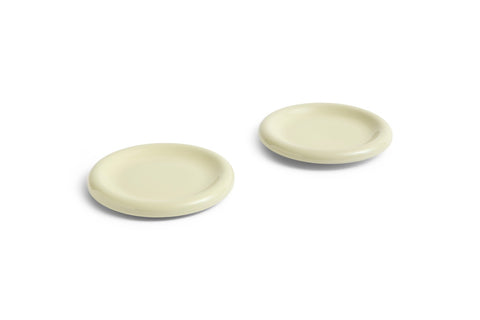 HAY Barro Plates, Ø18, Pistachio, glazed terracotta side plates in pale green, two shown at an angle on plain white