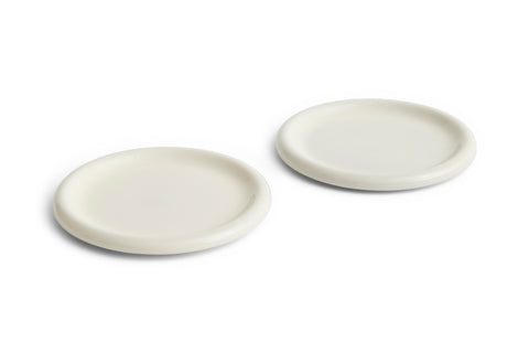 HAY Barro Plates, Ø24, Off-White, glazed terracotta dinner plates, two shown at an angle on a plain white background