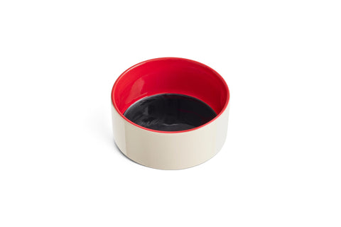 HAY Dog Bowl, Small, Blue, Red, glazed ceramic pet bowl, off-white outside with a red rim and navy blue interior on a plain white background