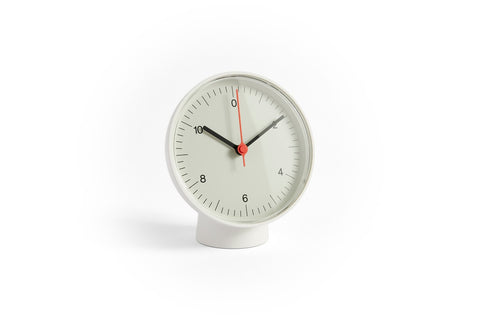 HAY Table Clock, White, white table clock, round white dial on a white pedestal base with a red second hand, plain white background