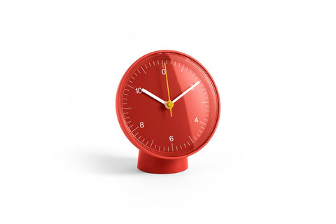 HAY Table Clock, Red, red table clock, red dial and pedestal base with white hands and a yellow second hand, plain white background