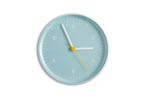 HAY Wall Clock, Blue, recycled ABS wall clock, light blue dial with white hands and a yellow second hand on a plain white background