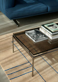 Sett LN12 Coffee Table by &Tradition with Smoked Cast Glass Top styled beside Inland AV22 Sofa and Cruise AP12 Rug