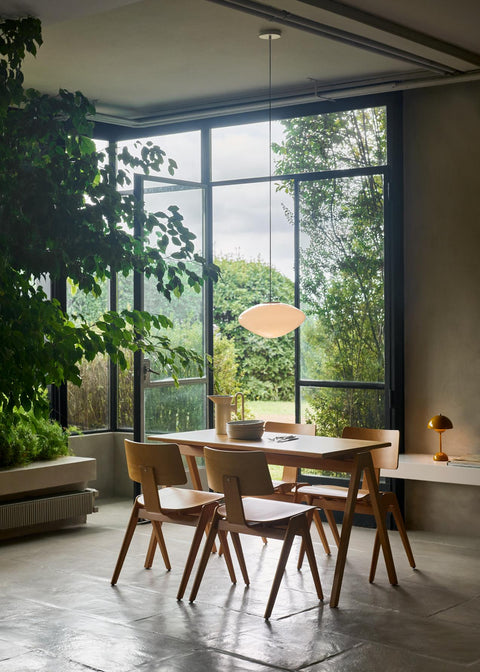 Daystak RD2 Table by &Tradition styled with Daystak RD1 Chairs, Flowerpot VP9 Lamp, and Mist AP15 Rug