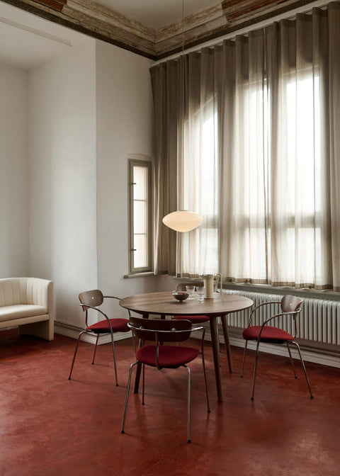 In Between SK15 Table by &Tradition paired with Pavilion AV4 Chairs and Loafer SC26 in a softly lit dining space