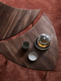Pair of &Tradition Pinwheel HM7 End Tables in walnut with brass legs styled with ceramics on red rug