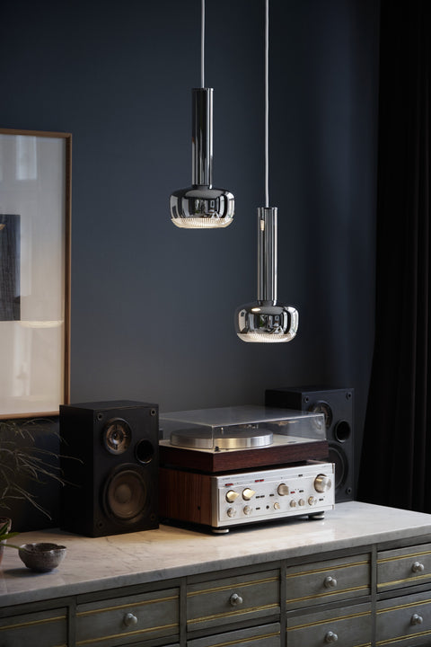 VL 56 Pendants above console by Louis Poulsen