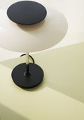 Top view of chrome PH-80 Table Lamp highlighting layered shade design and circular base