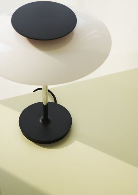 Top view of chrome PH-80 Table Lamp highlighting layered shade design and circular base