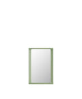 arced mirror by muuto in light green