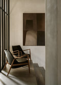 seal lounge chair in black leather and walnut frame designed by ib Kofod-Larsen for audo copenhagen