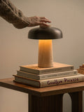 Audo Copenhagen Reverse Table Lamp, Portable in a styled interior