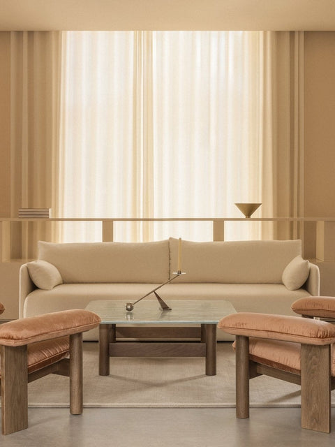 Audo Copenhagen Brasilia Lounge Table with the Interconnect Candle Holder and the Brasilia Lounge Chair