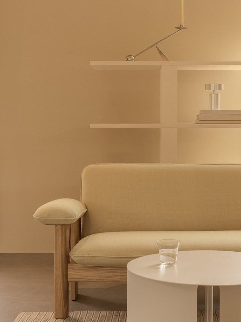 Audo Copenhagen Brasilia Sofa with the Interconnect Candle Holder and the Androgyne Side Table