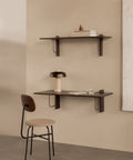 wall mounted dark oak desk with co-chair by audo copenhagen 