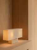 Audo Copenhagen Nonna Table Lamp, Travertine in a styled interior
