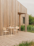 Audo Copenhagen Nook Dining Table with the Co Dining Chair and the Bottle Carafe