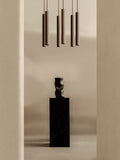 Audo Copenhagen Tubulaire Chandelier in a styled interior