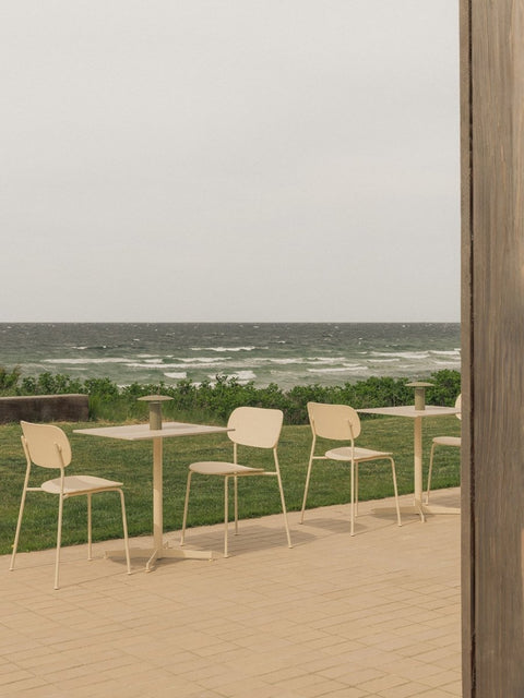 Audo Copenhagen Nook Dining Table with the Co Dining Chair and the Ray Table Lamp