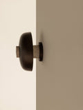 Audo Copenhagen Reverse Wall Lamp in a styled interior