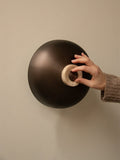 Audo Copenhagen Reverse Wall Lamp in a styled interior