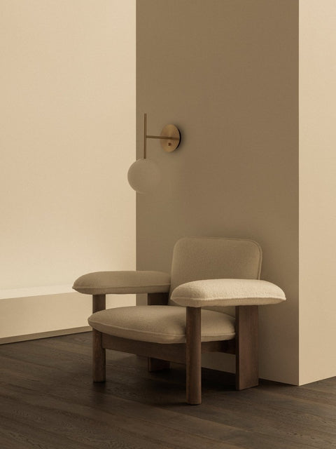 Audo Copenhagen Brasilia Lounge Chair, Low Back with the TR Bulb Suspended Wall Lamp