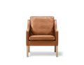 Borge Mogensen 2207 leather armchair in russet brown with oak legs front view by Fredericia