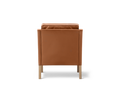 Borge Mogensen 2207 armchair back view in russet brown leather with oak legs by Fredericia