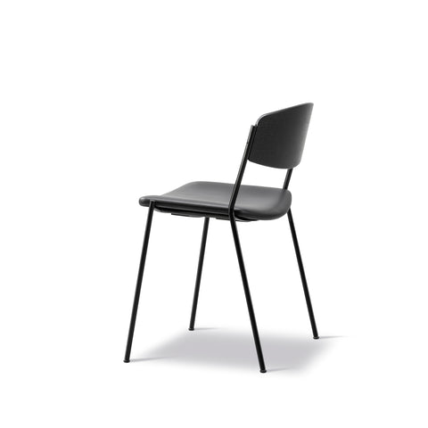 BM3081 Chair by Børge Mogensen, backrest in black oak with leather seat, supported by slender black legs.