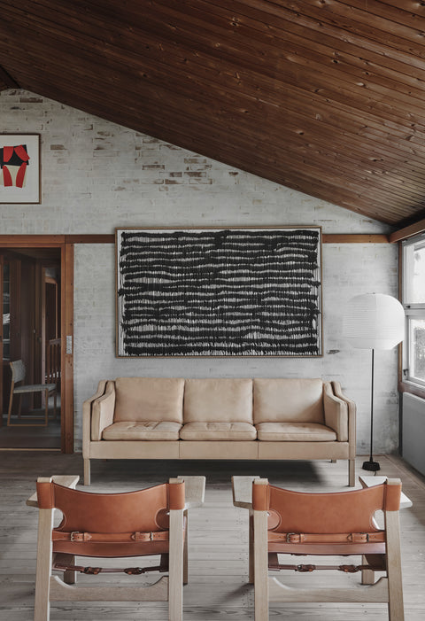 Natural leather Mogensen 2213 three seater styled with two Spanish Chairs in a Danish inspired living room