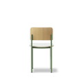 Back view of PLAN Chair by Fredericia showing oak backrest, upholstered seat, and slim tubular frame