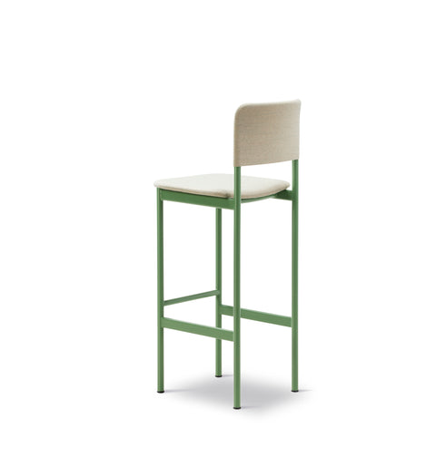 PLAN Barstool by Fredericia with upholstered seat and backrest in light fabric, modernist green steel frame.