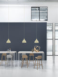 scandinavian office lobby with counter stools, table and lighting from muuto