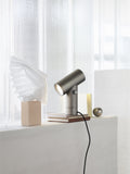 Close-up of Muuto Beam Table Lamp with dimmable LED light feature