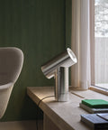 polished aluminum beam lamp by muuto 