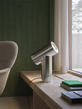 polished aluminum beam lamp by muuto 