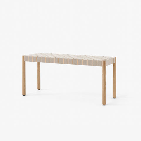 Betty TK4 Bench by &Tradition in oak with natural webbing on minimalist white background