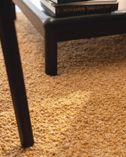 gold boucle area rug 