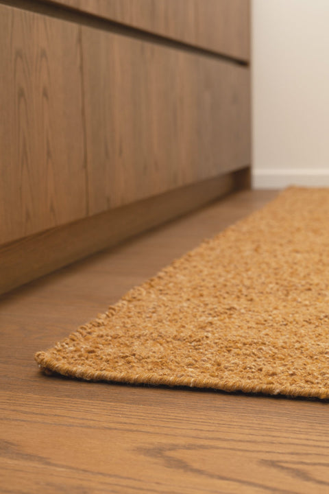 gold boucle runner by Mark Krebs