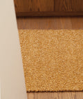 gold boucle runner by Mark Krebs