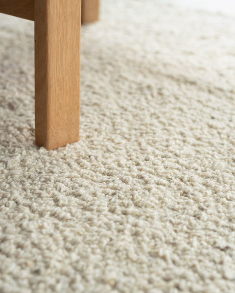 white boucle area rug by Mark Krebs